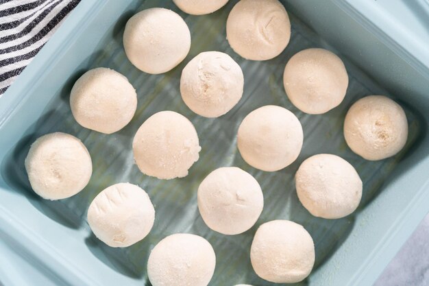 Baking dinner rolls from the premade frozen dough in the baking pan