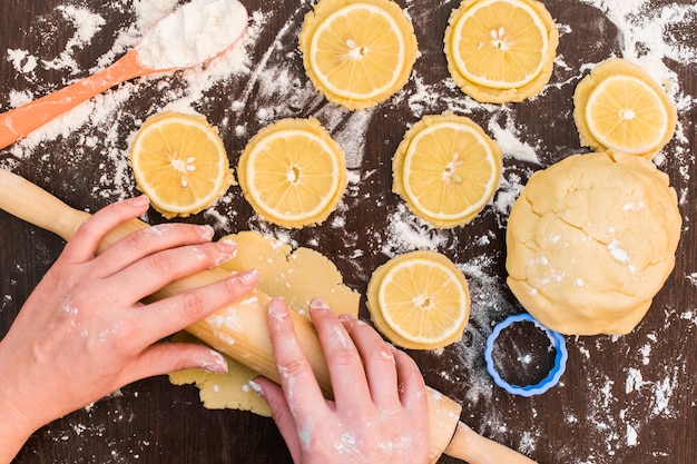 Baking gingerbread cookies, biscuits with lemon slices, lemon biscuits