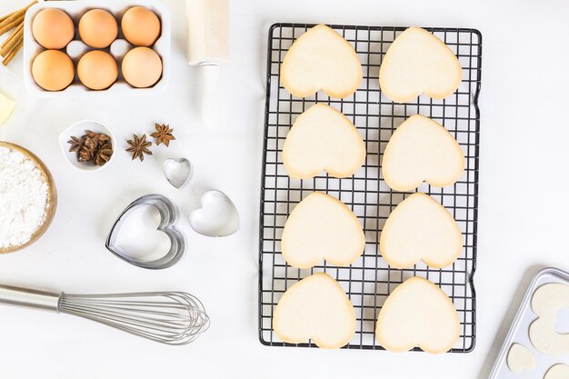 Baking heart shaped sugar cookies for Valentines Day.