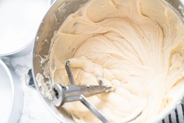 Baking homemade round vanilla cake.