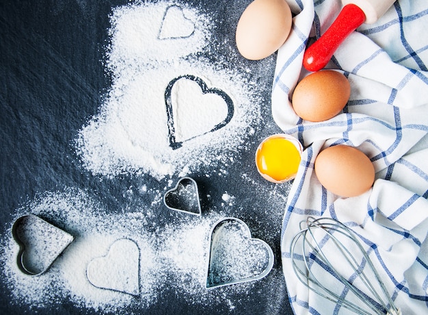 Baking ingredients on a black slate