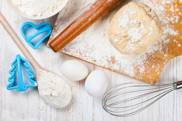 Baking ingredients on white wooden background. Top view