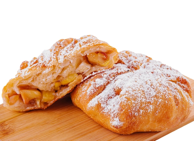 Baking puff pastry vertuta with apple or strudel