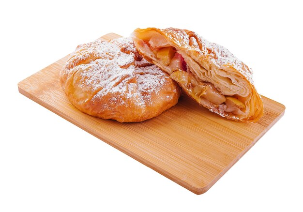 Baking puff pastry vertuta with apple or strudel