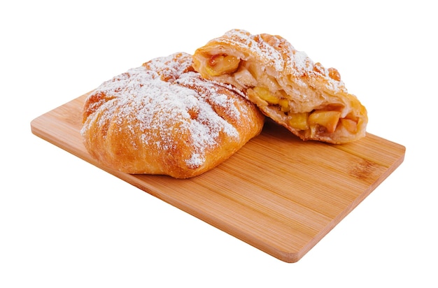 Baking puff pastry vertuta with apple or strudel