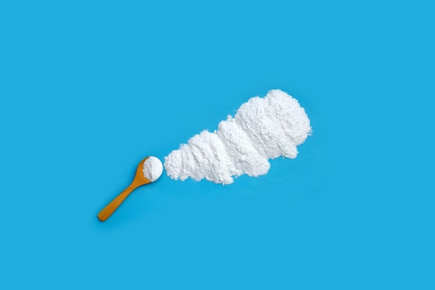 Baking soda on blue background