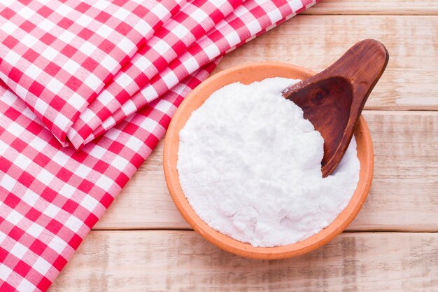 Baking soda in bowl on the table