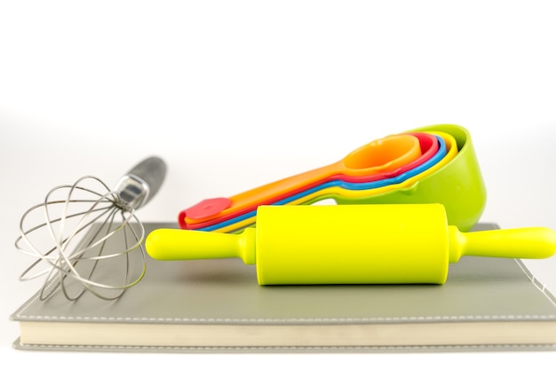 Baking tools and different shapes on white background 