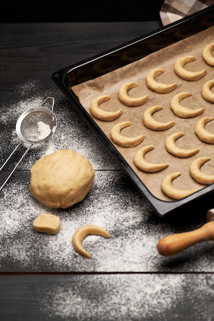 Baking tray with traditional german or austrian vanillekipferl vanilla kipferl cookies