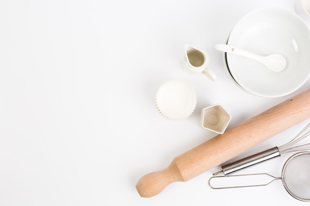 Baking utensils isolated on white backdrop