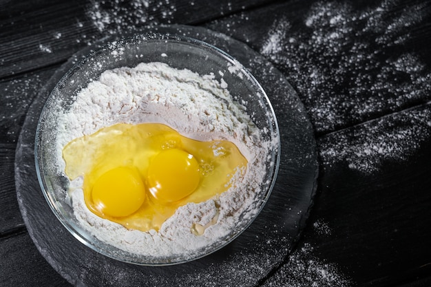 Baking with egg, flour . Selective focus.