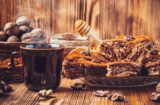 Baklava honey with walnuts. selective focus. food.