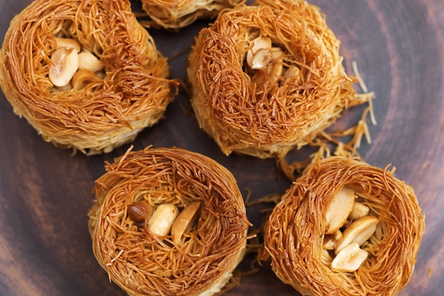 Baklava made of thin dough with chopped nuts and honey syrup, traditional Oriental sweets