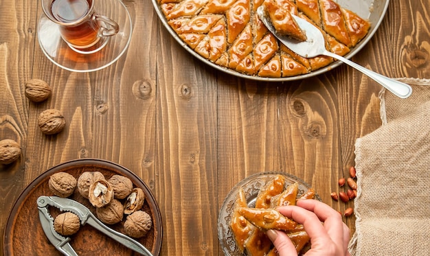 Baklava with nuts on a wooden background Selective focus