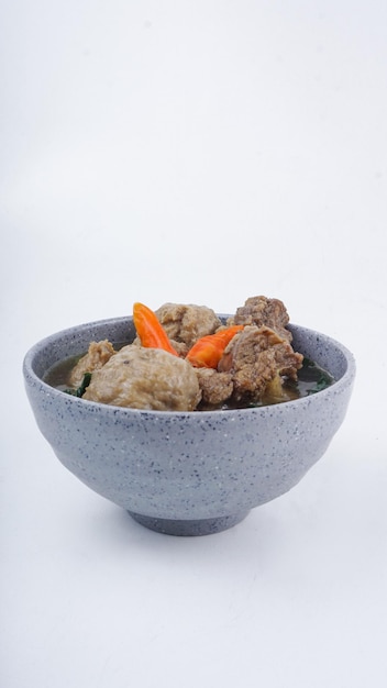 Bakso meatball soup in gray bowl indonesian cuisine