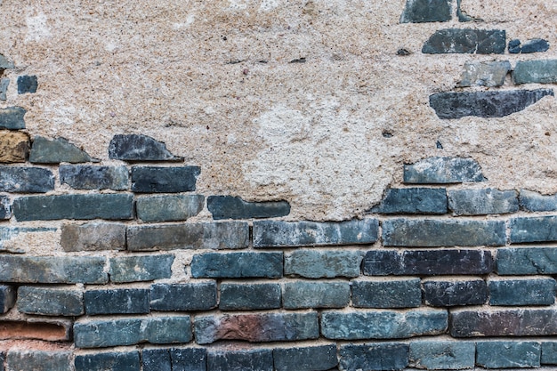 Bakstenen muur met cement