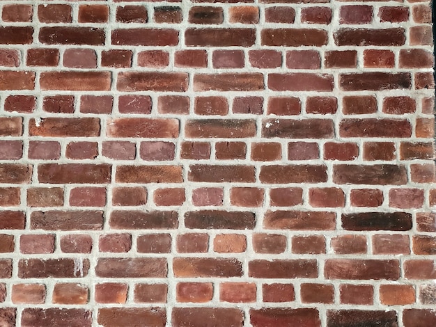 Bakstenen muur met rode baksteen, rode bakstenen achtergrond.