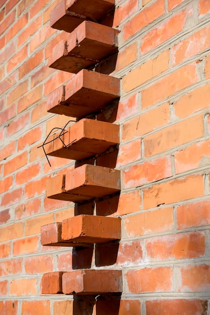 Bakstenen muur van het huis schoot close-up