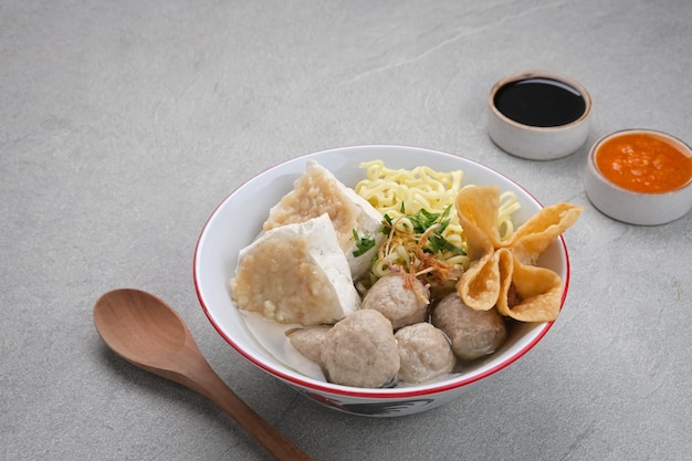 Bakwan Malang or Bakso Malang, traditional food from Malang, East Java, Indonesia. Meatballs soup