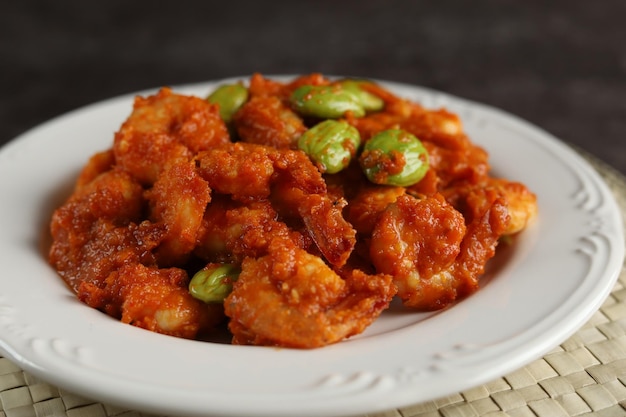 balado udang petai, traditional food made from petai, pete or mlanding (parkia speciosa) with shrimp