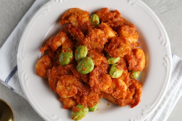 Balado udang Petai, traditional food made from petai, pete or mlanding (Parkia speciosa) with Shrimp