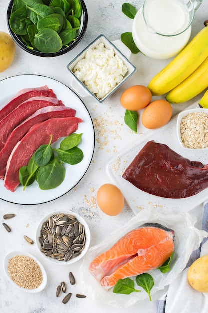 Balanced diet nutrition, healthy eating concept. Food sources rich in vitamin B6, pyridoxine on a kitchen table. Top view flat lay background