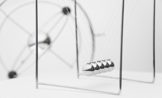 Balancing balls on a white background. business concept. Newtons Cradle