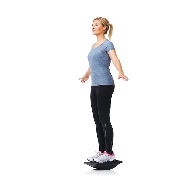 Balancing on her bosu Health Fitness