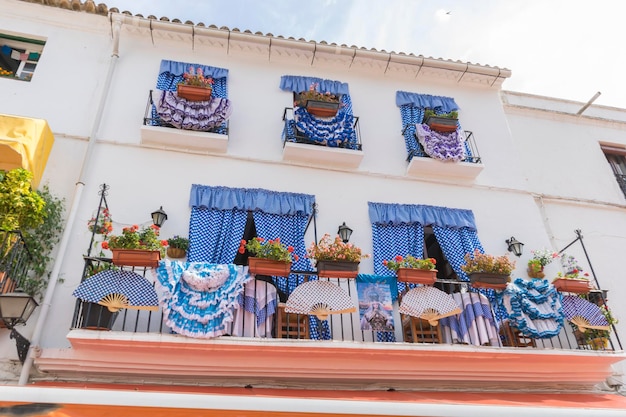 balconies with flamenco dresses in Marbella, Andalucia Spain