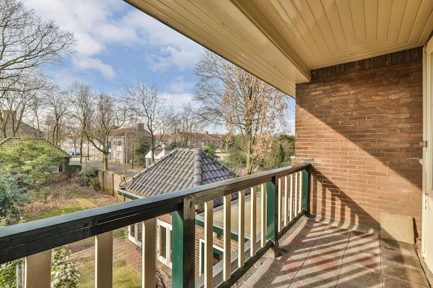 The balcony overlooks the roof of the building