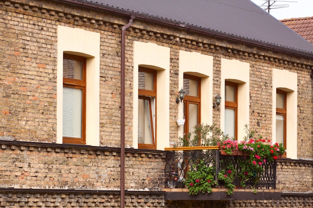 A balcony with flowers