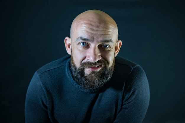 Bald bearded mustache hipster. portrait. Blue eyes