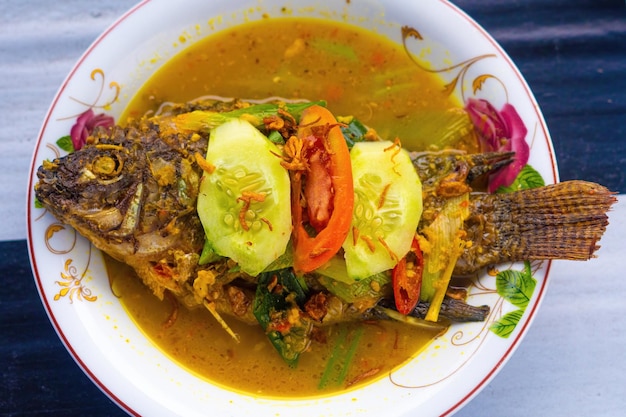 balinese grilled fish soup premium photo