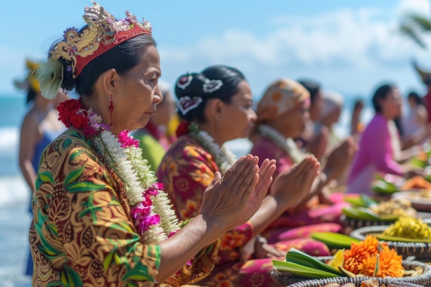 Balinese women praying at Kuta Beach Bali