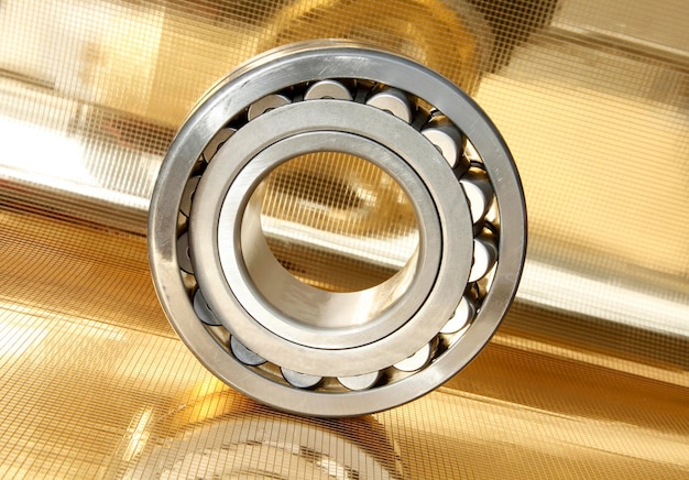 Ball bearings on yellow background