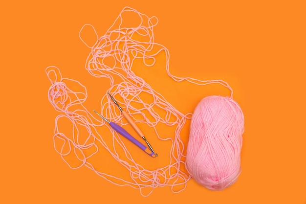 Ball of thread and crochet hooks