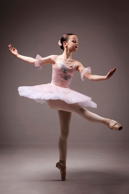 Ballerina Ballet Dancer Graceful Girl Teen dressed in Professional Ballet Tutu Skirt Ballet Shoes