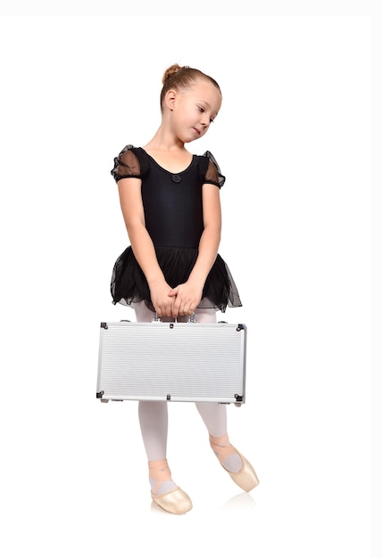 Ballerina in black tutu with case