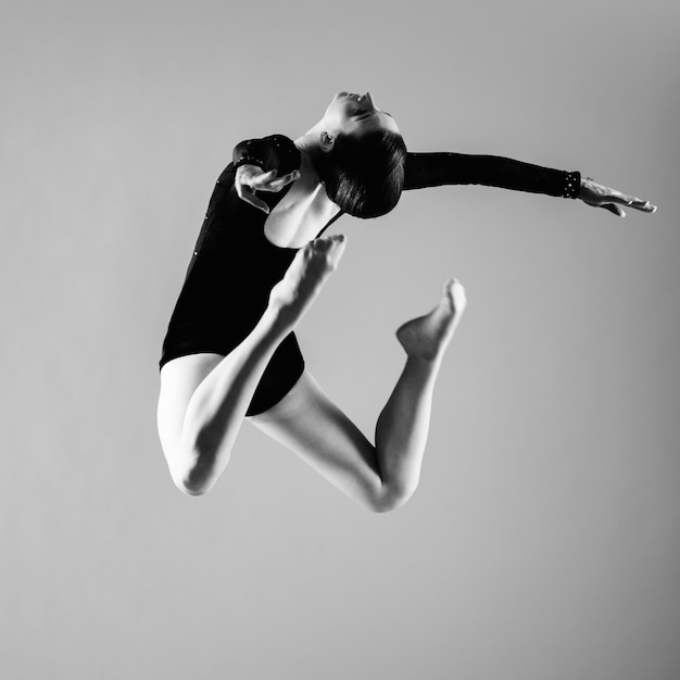 Ballerina jumping and dancing