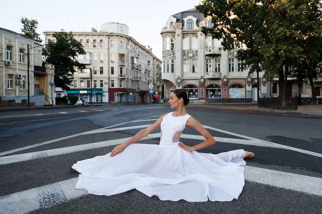 Ballerina on twine on road