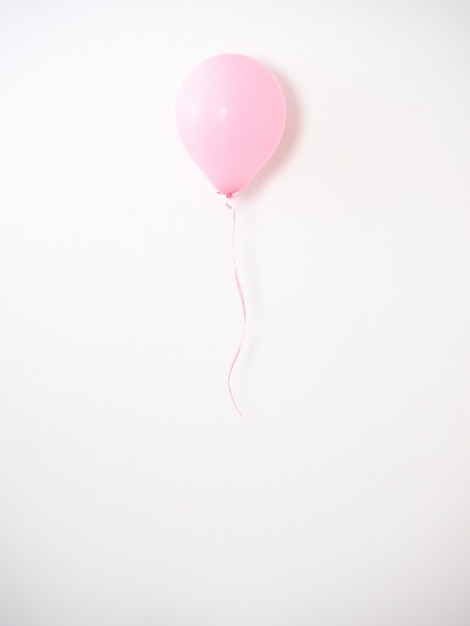 Balloon pink color pastel on gray 