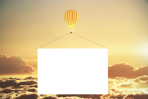 Воздушный шар с пустым рекламным баннером над облаками на закате макет
