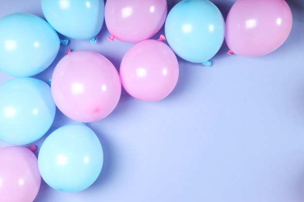 Balloons in color top view festive background with place for text