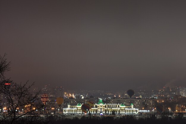 Balloons over the night city