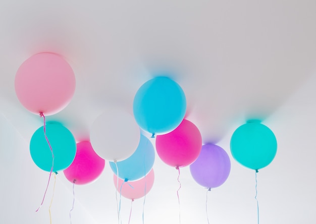 Balloons on white room