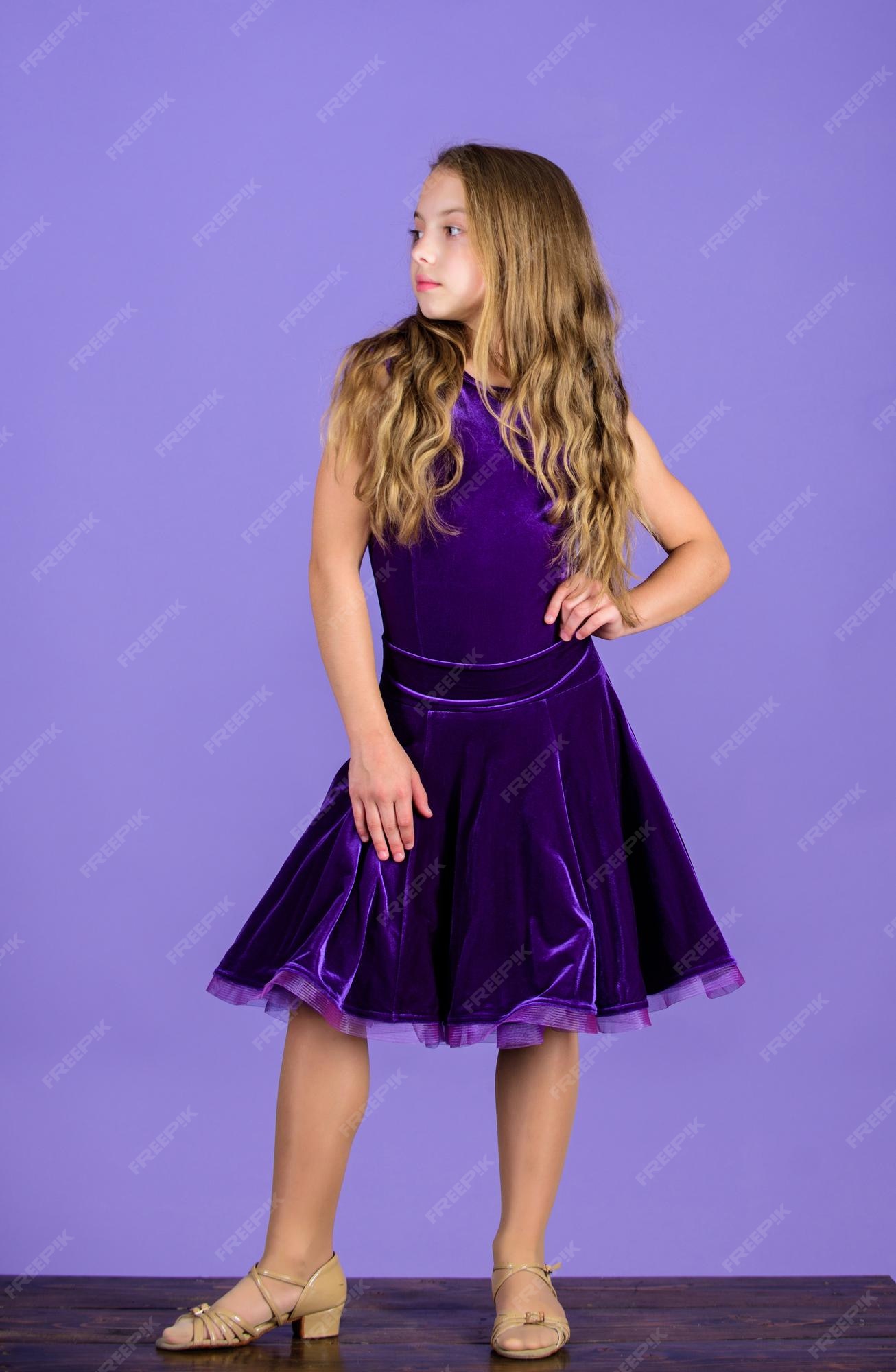 Premium Photo | Ballroom dancewear fashion concept kid dancer satisfied  with concert outfit ballroom fashion girl child wear velvet violet dress  clothes for ballroom dance kid fashionable dress looks adorable