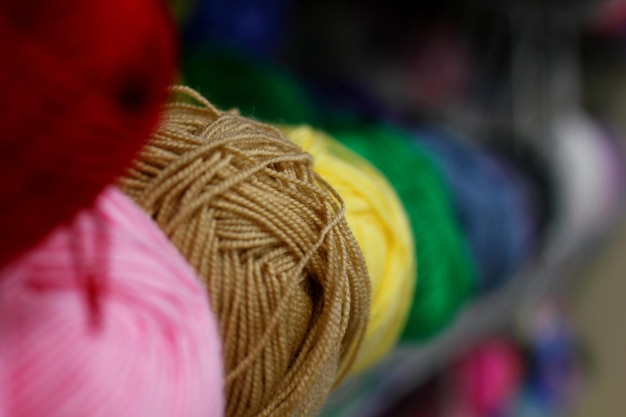 balls of colored wool threads on the counter