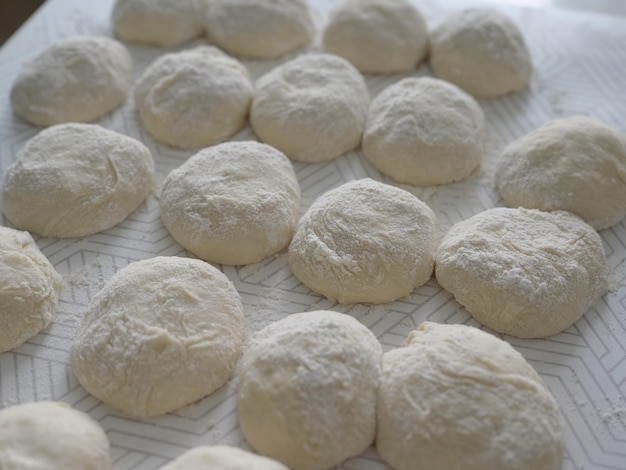 Balls of dough for pizza bread or buns closeup