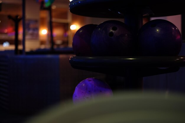 Photo balls on rack at bowing alley