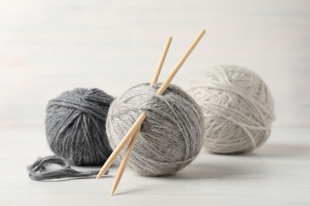 Knitting Yarn Balls And Needles In Basket On A White Background Stock  Photo, Picture and Royalty Free Image. Image 16977357.